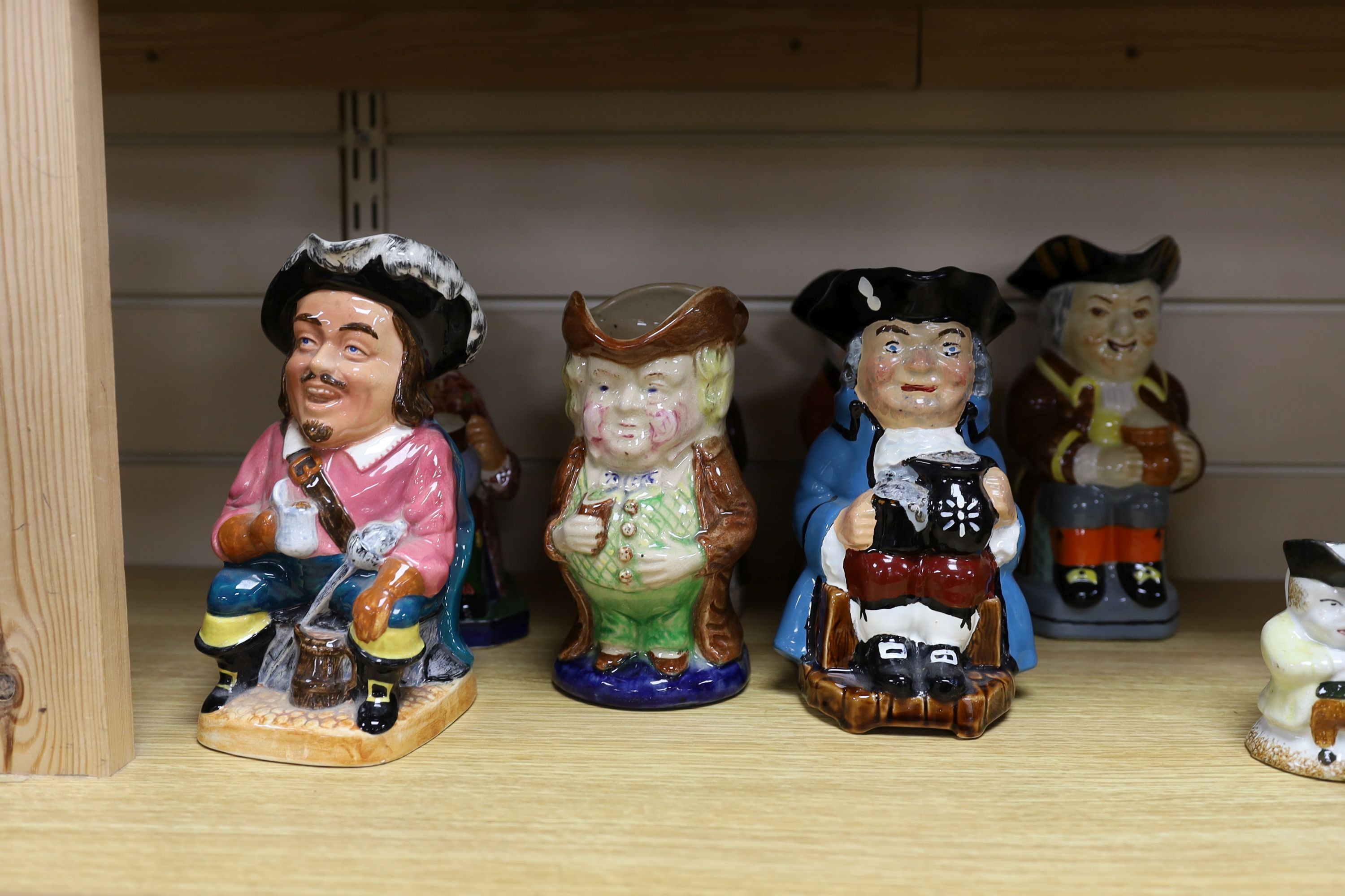 A Copeland Toby jug and twelve other Toby jugs